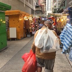 Man Carrying All of His Belongings